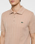 LACOSTE LOGO-APPLIQUÉ RIBBED KNIT POLO SHIRT – LIGHT BEIGE