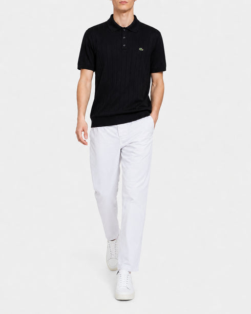 LACOSTE LOGO-APPLIQUÉ RIBBED KNIT POLO SHIRT – BLACK