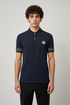 BALMAIN PARIS EDGE SLEEVE STATEMENT POLO – METALLIC B BUTTON EDITION