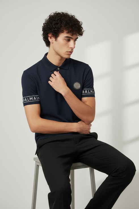 BALMAIN PARIS EDGE SLEEVE STATEMENT POLO – METALLIC B BUTTON EDITION